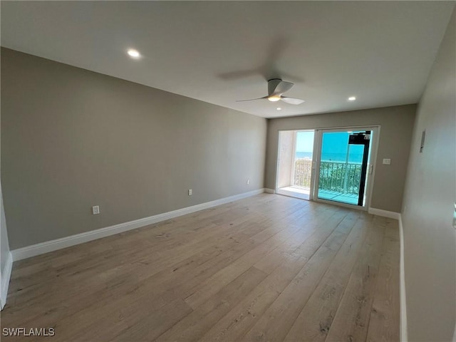 unfurnished room featuring recessed lighting, a ceiling fan, baseboards, and light wood finished floors