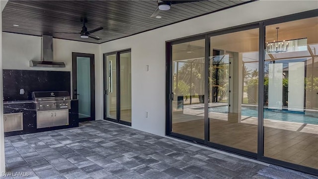 view of patio / terrace featuring an outdoor kitchen, a grill, and ceiling fan