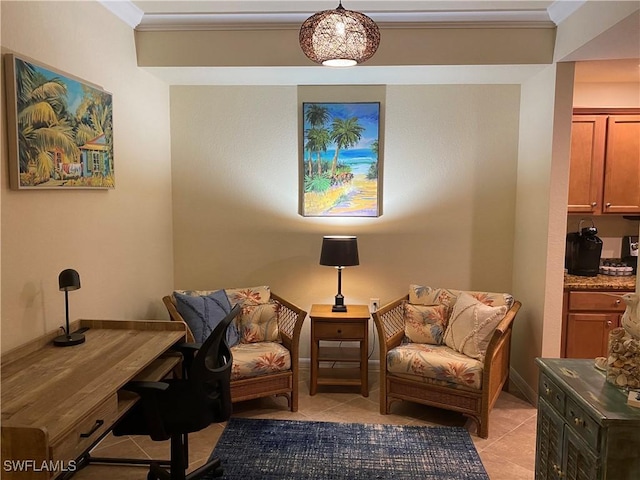 sitting room with light tile patterned flooring, baseboards, and ornamental molding