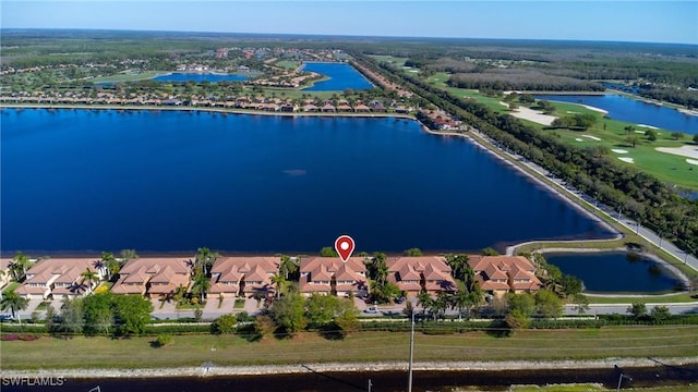 birds eye view of property with a residential view and a water view