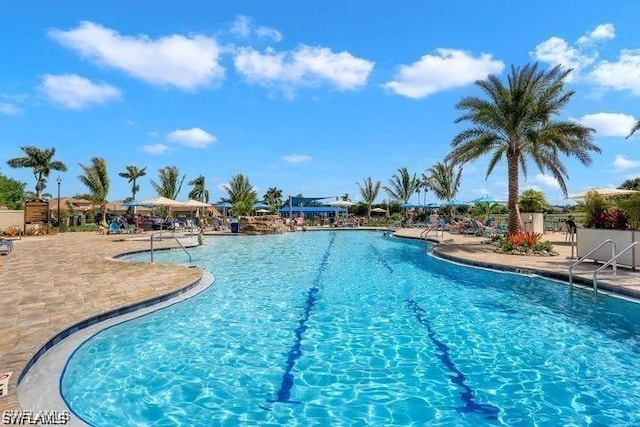 community pool with a patio