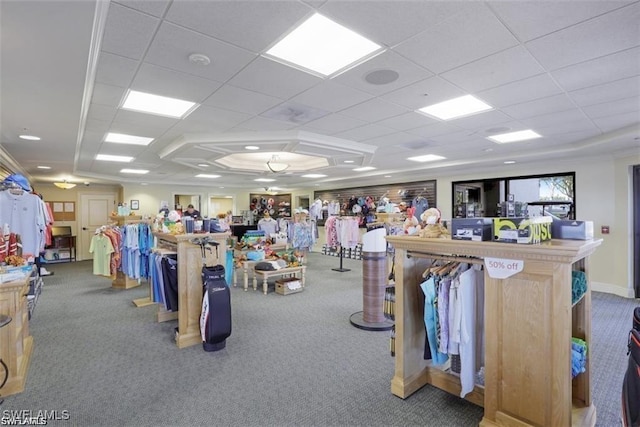 miscellaneous room featuring a drop ceiling and carpet floors