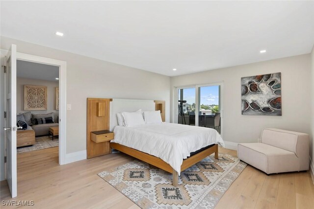 bedroom with recessed lighting, baseboards, light wood-style floors, and access to outside
