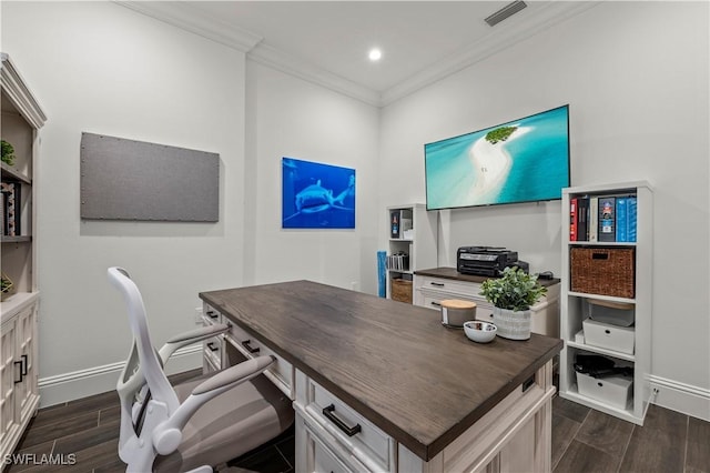 office area with dark wood finished floors, crown molding, baseboards, and visible vents