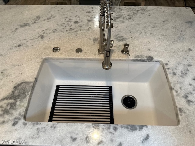 interior details featuring a sink