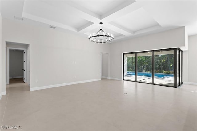 unfurnished room with coffered ceiling, baseboards, and an inviting chandelier