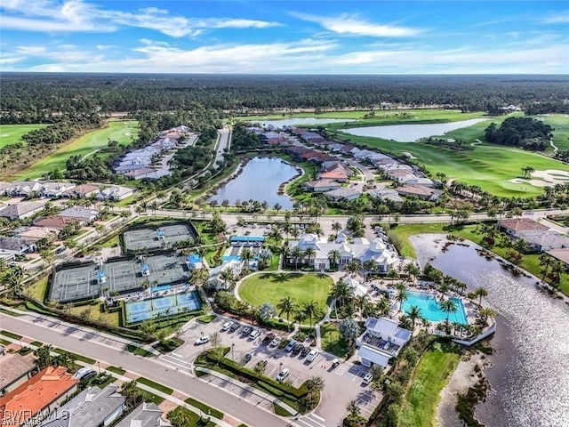 drone / aerial view featuring a water view and golf course view