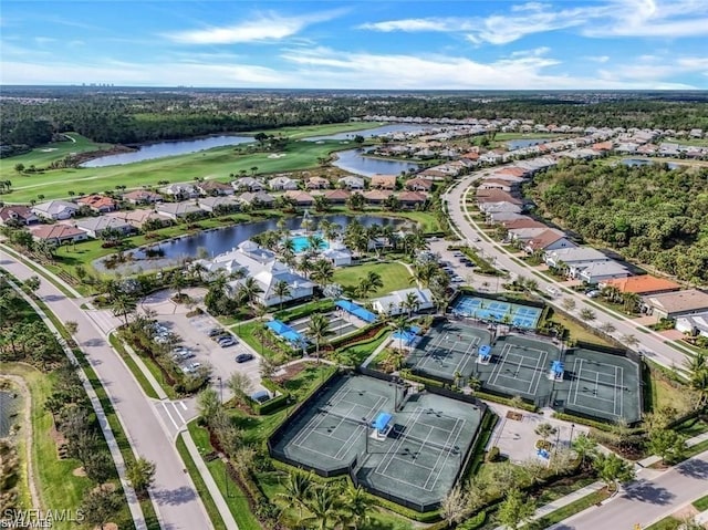 bird's eye view featuring a water view and golf course view