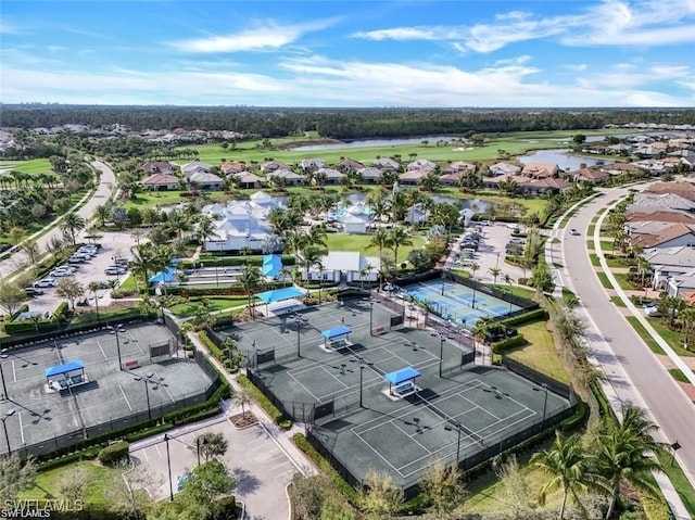 aerial view with a water view and a residential view