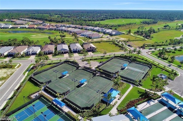 bird's eye view with view of golf course and a residential view