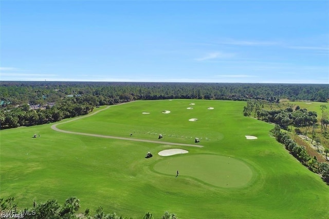 bird's eye view with view of golf course