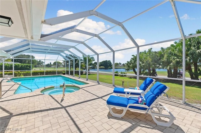 view of pool featuring a water view, a pool with connected hot tub, a lanai, and a patio area