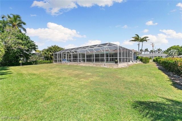 view of yard with a lanai