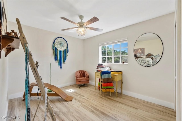 17450 Taylor Rd, Alva, FL 33920 - playroom with baseboards, wood finished floors, and a ceiling fan