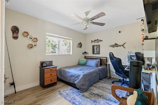 17450 Taylor Rd, Alva, FL 33920 - bedroom with light wood-type flooring, baseboards, and ceiling fan