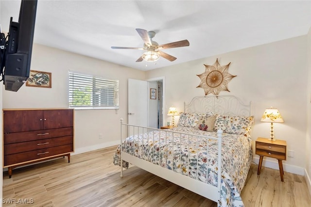 17450 Taylor Rd, Alva, FL 33920 - bedroom with ceiling fan, baseboards, and wood finished floors