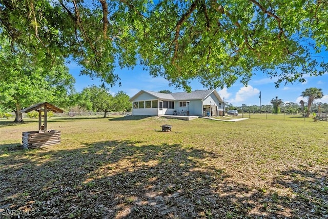 17450 Taylor Rd, Alva, FL 33920 - view of yard featuring fence and a sunroom
