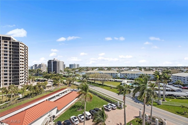 birds eye view of property with a city view