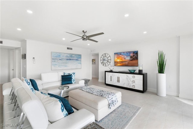 living room featuring light tile patterned flooring, visible vents, recessed lighting, and ceiling fan