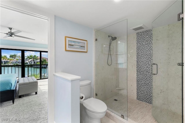 full bath with visible vents, a water view, toilet, a stall shower, and ensuite bath