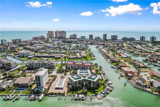 bird's eye view with a water view and a city view