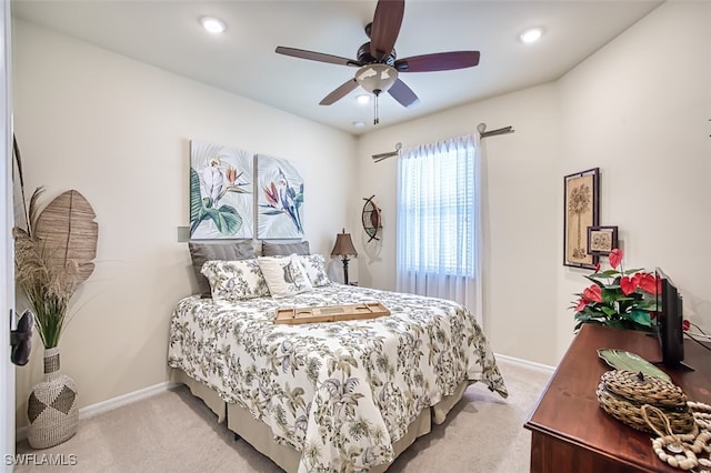 bedroom with recessed lighting, baseboards, light colored carpet, and ceiling fan