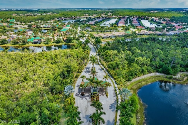 aerial view with a residential view and a water view