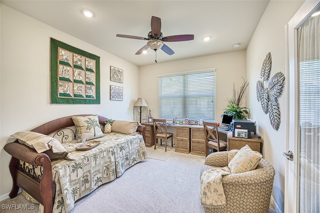 carpeted office space with recessed lighting and a ceiling fan