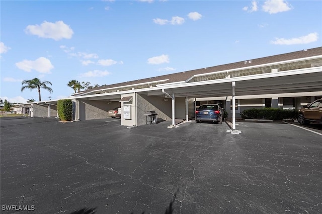 1011 SE 38th Ter Unit 2213, Cape Coral, FL 33904 - view of covered parking lot