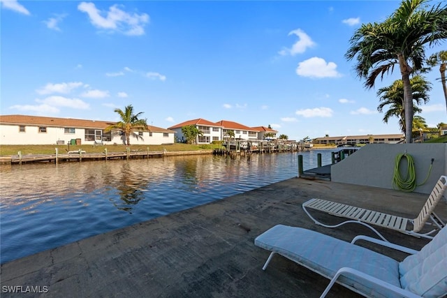 1011 SE 38th Ter Unit 2213, Cape Coral, FL 33904 - view of dock with a water view and a residential view
