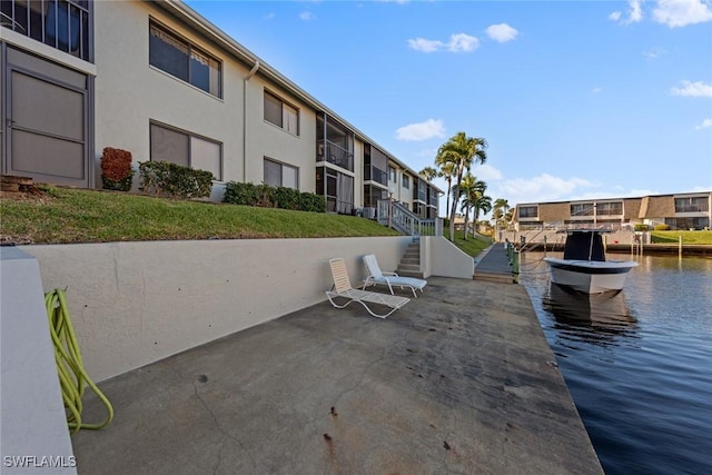 1011 SE 38th Ter Unit 2213, Cape Coral, FL 33904 - exterior space with a water view and a residential view