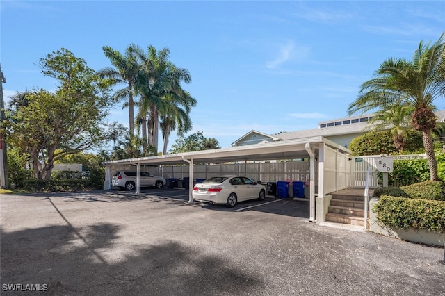 covered parking lot with fence