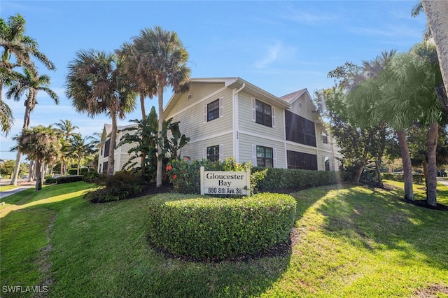 view of home's exterior featuring a yard