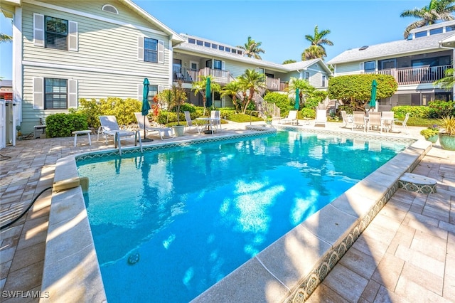 pool featuring a patio area