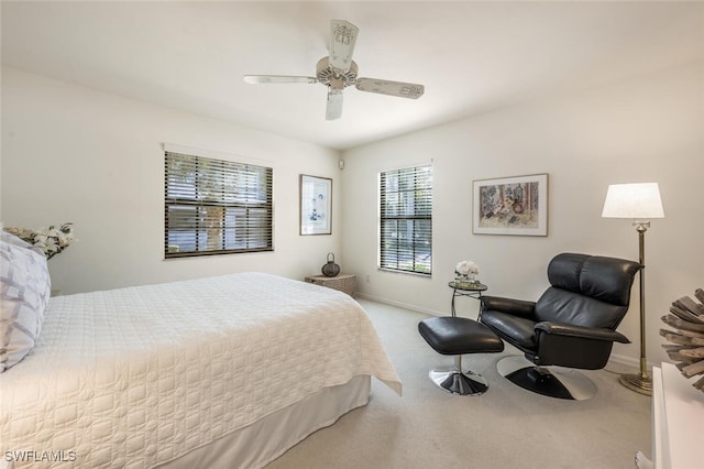 bedroom featuring baseboards, carpet, and ceiling fan