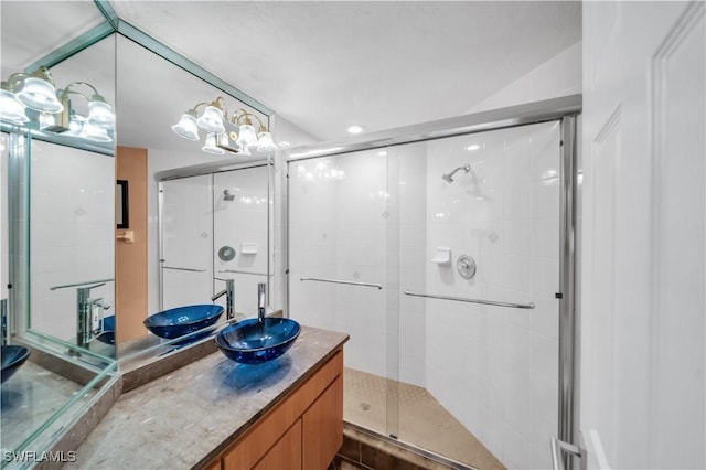 full bathroom featuring a shower stall and vanity