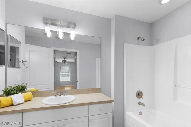 821 Casino Ave, Lehigh Acres, FL 33971 - bathroom featuring shower / bathtub combination and vanity