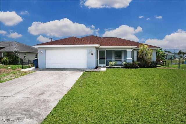 821 Casino Ave, Lehigh Acres, FL 33971 - single story home featuring stucco siding, a garage, and driveway