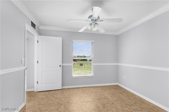 821 Casino Ave, Lehigh Acres, FL 33971 - tiled empty room featuring a ceiling fan, baseboards, and crown molding