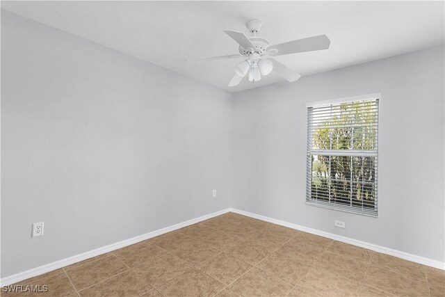 821 Casino Ave, Lehigh Acres, FL 33971 - unfurnished room featuring a ceiling fan and baseboards