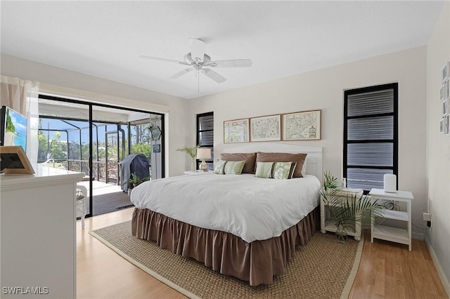 bedroom featuring light wood-style flooring, baseboards, access to exterior, and a ceiling fan