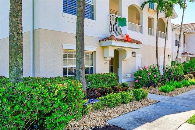 doorway to property with stucco siding