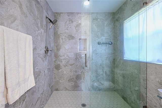 bathroom with a stall shower