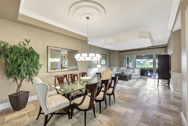 9293 Menaggio Ct Unit 102, Naples, FL 34114 - dining space featuring stone tile flooring, a chandelier, baseboards, and ornamental molding