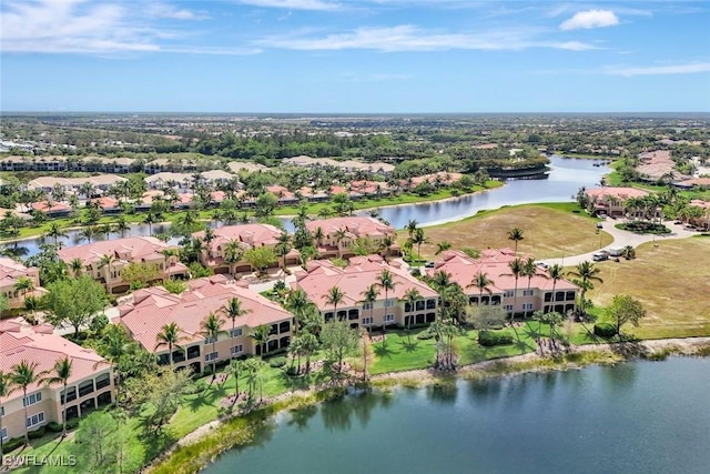 9293 Menaggio Ct Unit 102, Naples, FL 34114 - drone / aerial view with a residential view and a water view