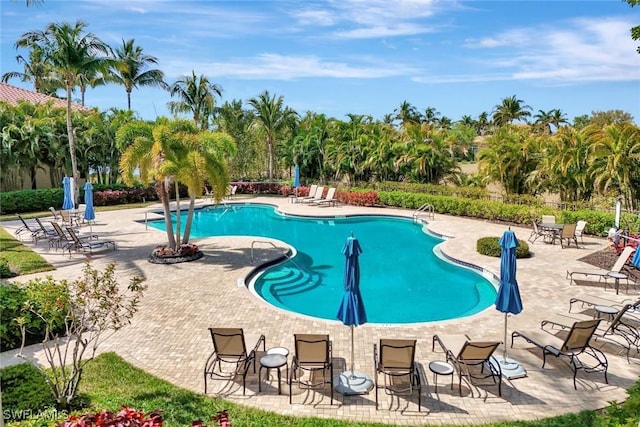9293 Menaggio Ct Unit 102, Naples, FL 34114 - pool featuring a patio area and fence