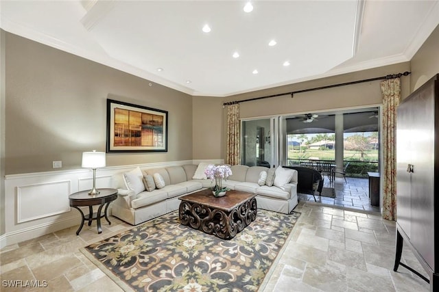 9293 Menaggio Ct Unit 102, Naples, FL 34114 - living room featuring crown molding, wainscoting, and stone tile flooring