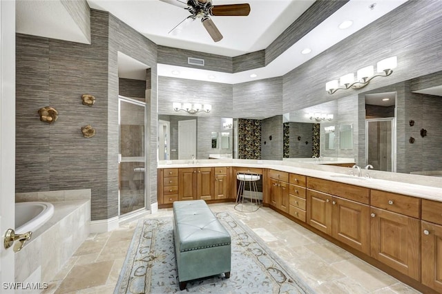 9293 Menaggio Ct Unit 102, Naples, FL 34114 - bathroom featuring tile walls, stone tile flooring, a stall shower, and ceiling fan