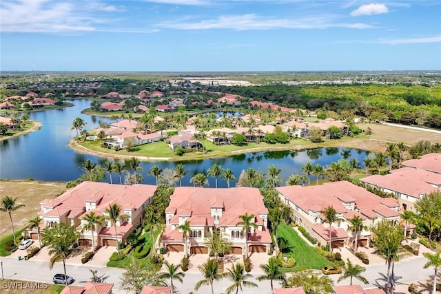 9293 Menaggio Ct Unit 102, Naples, FL 34114 - drone / aerial view with a residential view and a water view