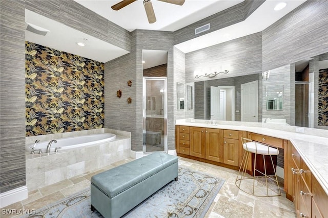 9293 Menaggio Ct Unit 102, Naples, FL 34114 - bathroom with a garden tub, a ceiling fan, stone tile floors, a shower stall, and vanity